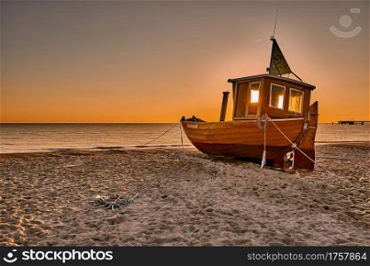 fishing boat on the beach of Usedom in the morning