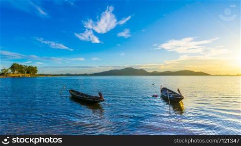 Fishing boat with sunset at Bang phra reservoir ,sriracha chon buri, thailand