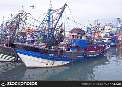 Fishing boats at the harbor from Essaouria. Essaouria is the most popular Atlantic coast city in Morocco.