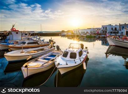 Fishing boats in port of Naousa on sunrise. Paros lsland, Greece. Fishing boats in port of Naousa. Paros lsland, Greece
