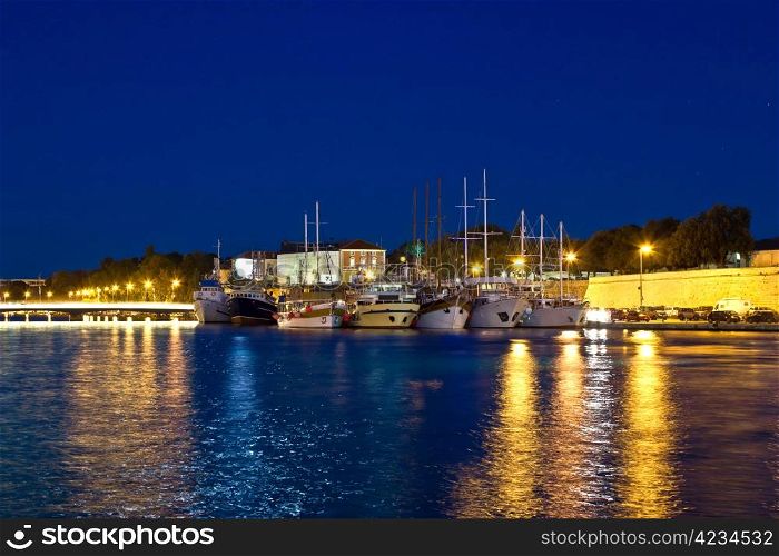 Fishing boats in safe harbor on evening in Zadar, Croatia, Dalmatia