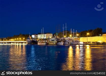 Fishing boats in safe harbor on evening in Zadar, Croatia, Dalmatia