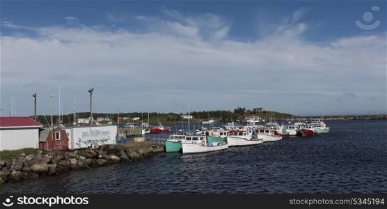 Fishing boats moored at harbor, Main-a-Dieu, Cape Breton Island, Nova Scotia, Canada