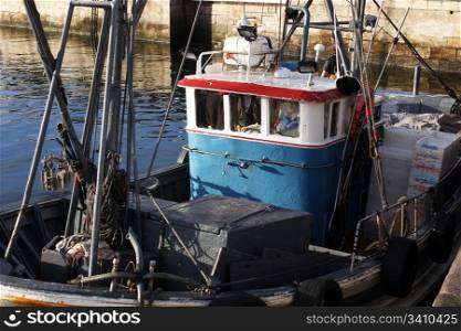 fishing boats moored at the port