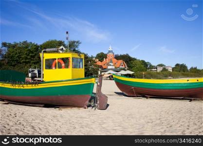 Fishing boats on a sandy beach in Poland