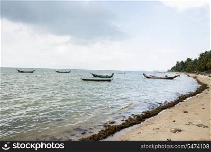 Fishing boats on shore; Koh Pha Ngan; Thailand