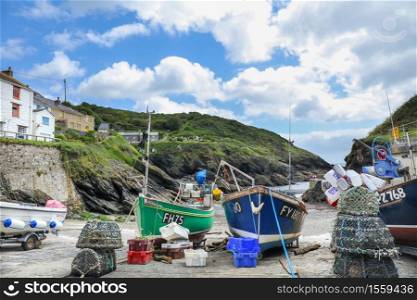 Fishing boats on the beach at Portloe on the south Cornwall coast