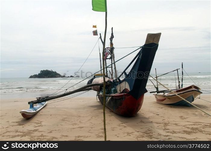 Fishing catamaran on the beach in Sri Lanka