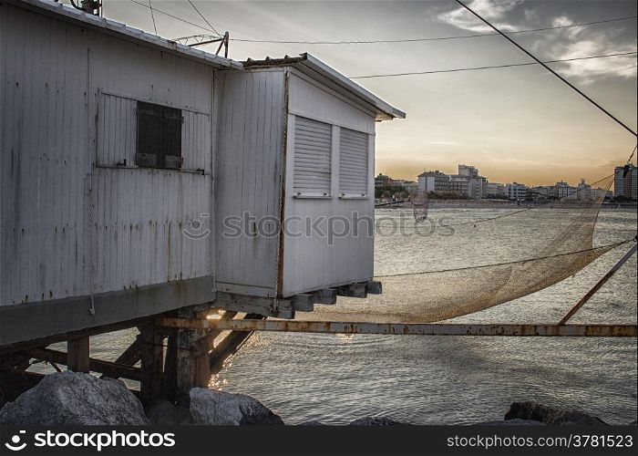 Fishing hut in the harbour channel of Cervia in Northern Italy on the Adriatic Sea