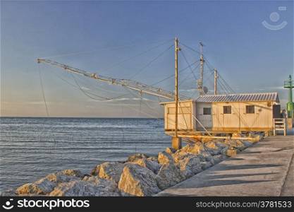 Fishing hut in the harbour channel of Cervia in Northern Italy on the Adriatic Sea
