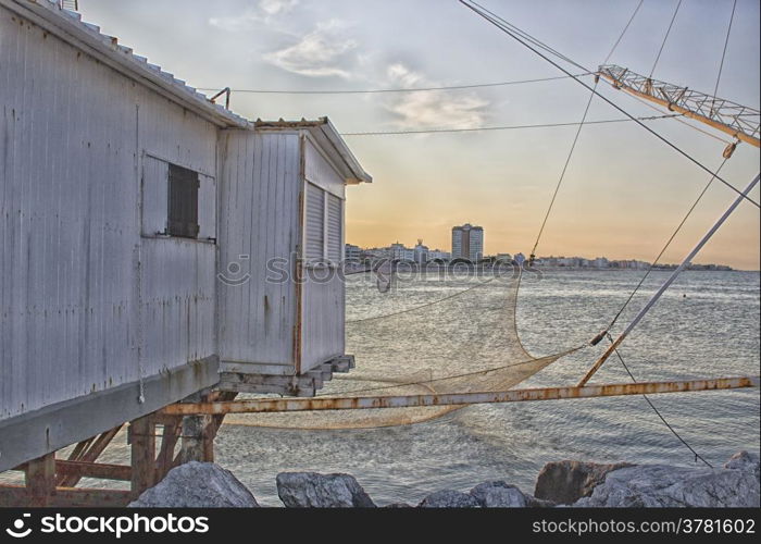 Fishing hut in the harbour channel of Cervia in Northern Italy on the Adriatic Sea