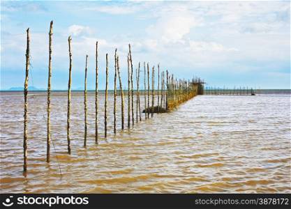 fishing nets at low tide in Thailand. Fishing In Thailand