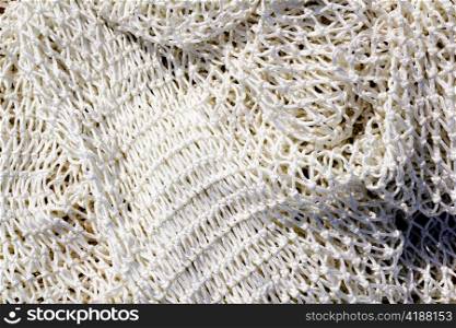 fishing new white net texture closeup in Mediterranean port