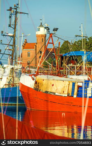 Fishing port of Ustka, Poland with old lighthouse