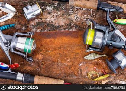 fishing rod and reel with line on natural background for frame, print, design