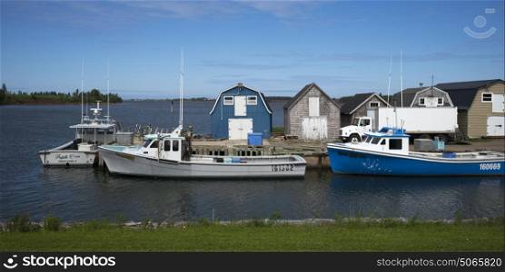 Fishing sheds and boats at dock, Green Gables, Prince Edward Island, Canada
