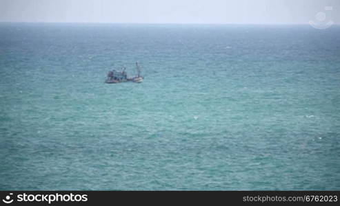 Fishing ship in open sea