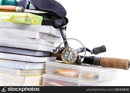 fishing tackles and baits with books on white background for outdoor business