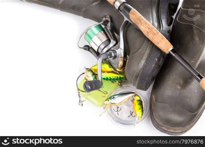 fishing tackles and rubber boots on white background. for design advertising or publication