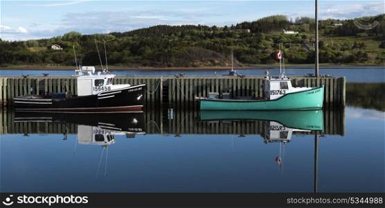 Fishing trawlers moored at dock, Inverness Harbour, Mabou, Cape Breton Island, Nova Scotia, Canada