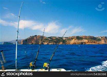 Fishing trolling boat rods in Mediterranean Cabo Nao Cape at Alicante Spain