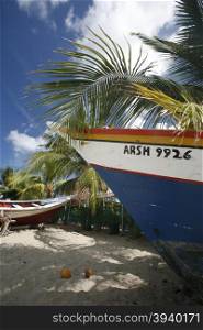 fishingboat at the beach in the town of Juangriego on the Isla Margarita in the caribbean sea of Venezuela.. SOUTH AMERICA VENEZUELA ISLA MARGATITA JUANGRIEGO BEACH