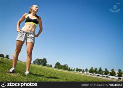 Fit, athletic woman determined to reach her goals