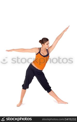 Fit attractive young woman doing first stage of yoga exercise called Triangle Pose, isolated on white background