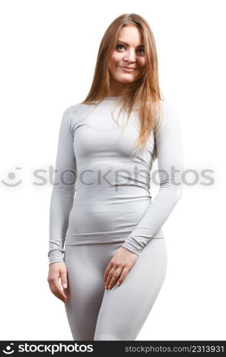 Fit fitness slim woman, sporty girl wearing hot gray sports thermolinen underwear, long sleeves top and leggings. Isolated on white. Fit woman in thermolinen underwear