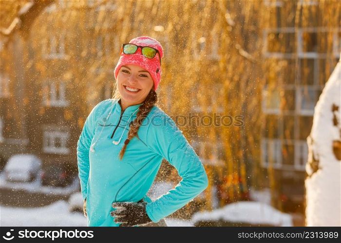 Fit girl in winter aura. Presenting beauty in snow. Health nature fitness fashion concept. . Sporty girl showing her beauty