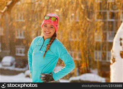 Fit girl in winter aura. Presenting beauty in snow. Health nature fitness fashion concept. . Sporty girl showing her beauty