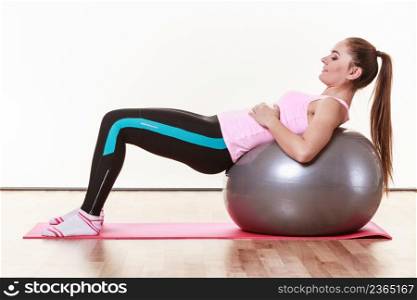 Fit girl working out. Young woman exercising in gym. Health fitness activity concept. . Fit girl working out.