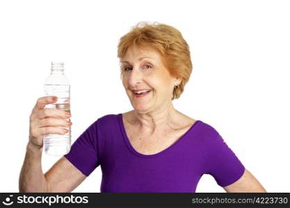 Fit senior lady in a leotard about to drink a bottle of water. Isolated on white.