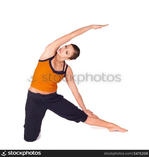 Fit woman doing yoga exercise called Gate Pose, sanskrit name: Parighasana, isolated over white background