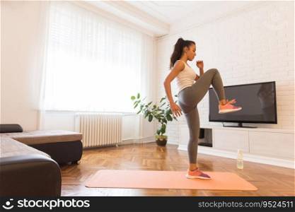 Fit woman exsercise in the room at home