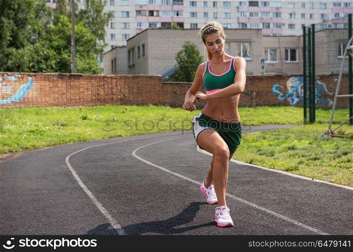 Fit woman training. Fit woman training in bright sunny day