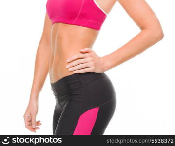 fitness and diet concept - close up of beautiful athletic female abs in sportswear