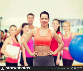 fitness and diet concept - smiling teenage girl in sportswear