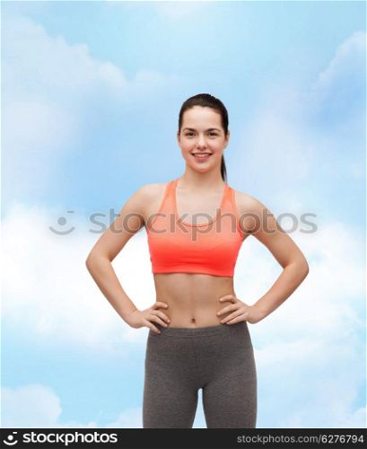 fitness and diet concept - smiling teenage girl in sportswear
