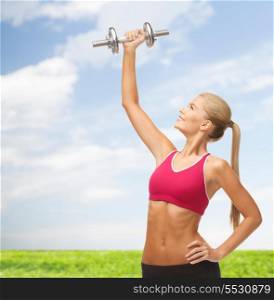 fitness and diet concept - young sporty woman lifting steel dumbbell