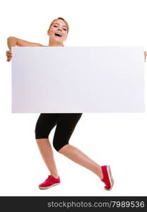 Fitness and health lifestyle advertisement. Laughing young woman girl holding presenting blank empty banner ad copyspace isolated on white background.