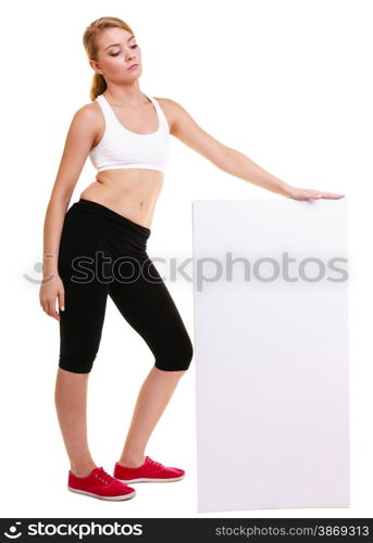 Fitness and health lifestyle advertisement. Young woman girl holding banner high up presenting blank empty ad copyspace isolated on white background.