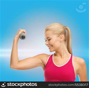 fitness and healthcare concept - young sporty woman with light dumbbell
