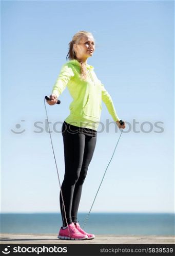 fitness and lifestyle concept - woman doing sports outdoors. woman doing sports outdoors