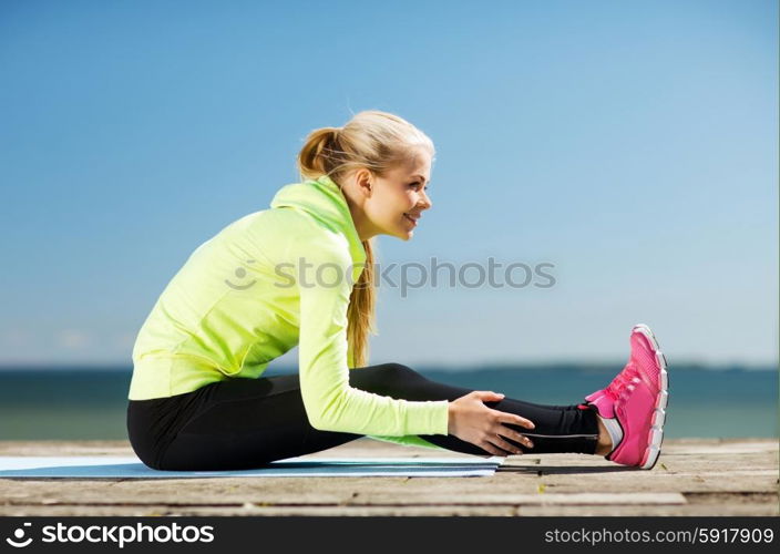 fitness and lifestyle concept - woman doing sports outdoors. woman doing sports outdoors