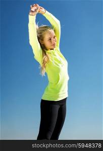 fitness and lifestyle concept - woman doing sports outdoors. woman doing sports outdoors