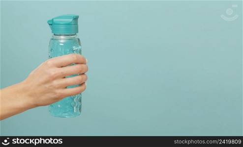 fitness bottle filled with water copy space