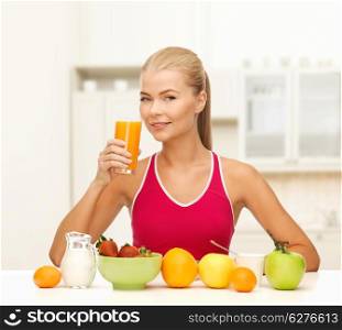 fitness, diet and healthcare concept - smiling young woman with healthy breakfast and drinking orange juice