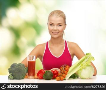 fitness, diet and healthcare concept - smiling young woman with organic food on the table