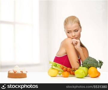fitness, diet, health and food concept - doubting woman with fruits and pie